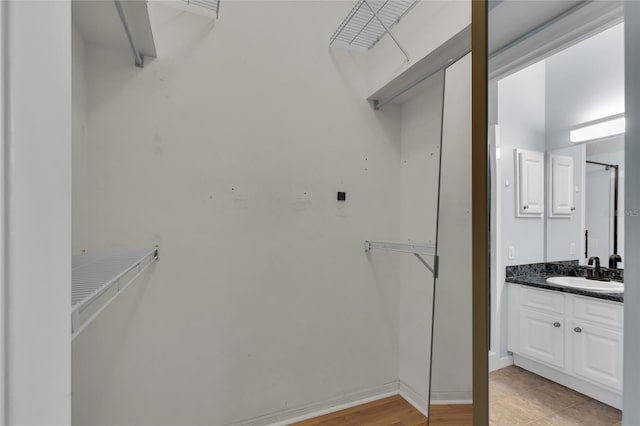 956 Chula Ct, The Villages, FL 32159 - walk in closet with a sink