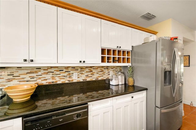 kitchen with stainless steel fridge, black dishwasher, and white cabinetry