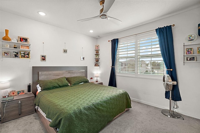 bedroom with ceiling fan and carpet