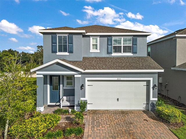 front facade with a garage