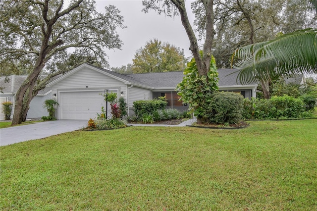 ranch-style house with a front yard and a garage