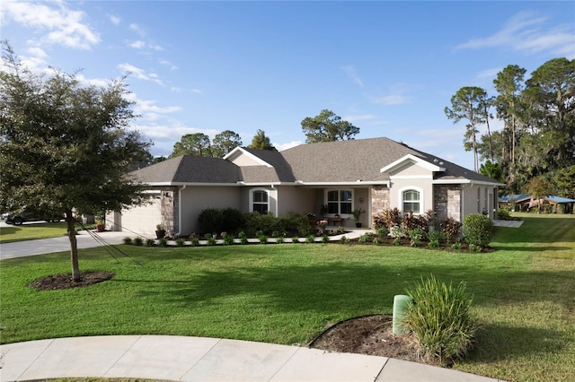 ranch-style house with a front yard and a garage