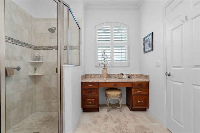 bathroom with an enclosed shower and crown molding