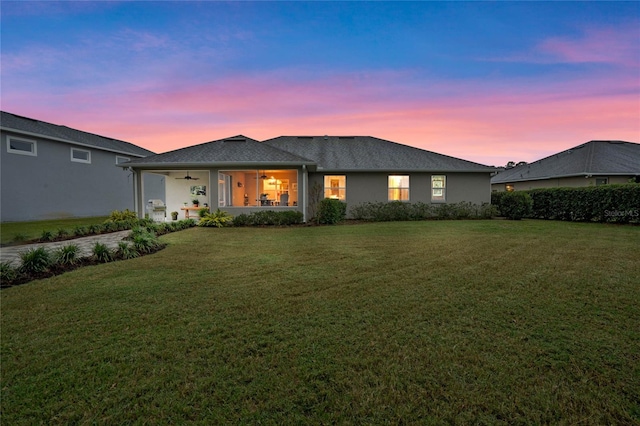 view of front of home featuring a yard