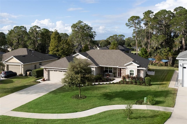 ranch-style home with a garage and a front yard