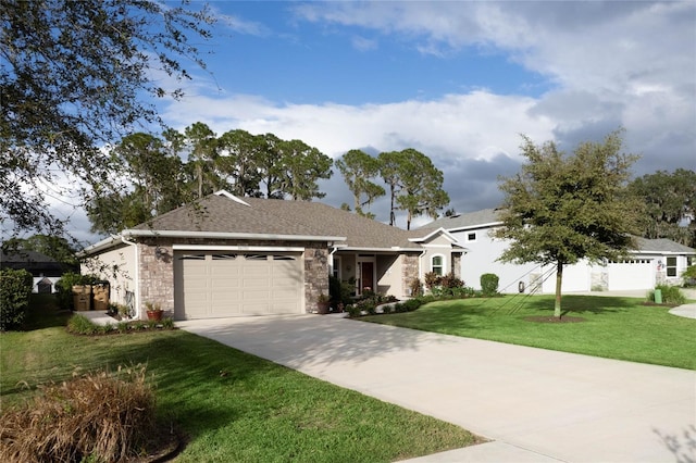 ranch-style home featuring a garage and a front lawn