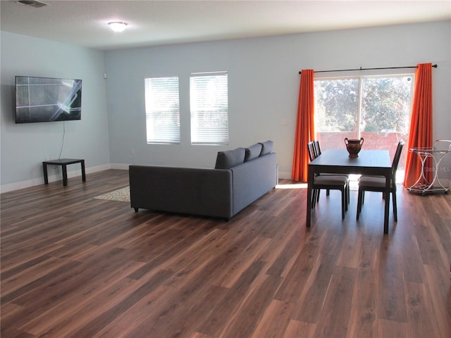 living room featuring dark hardwood / wood-style floors