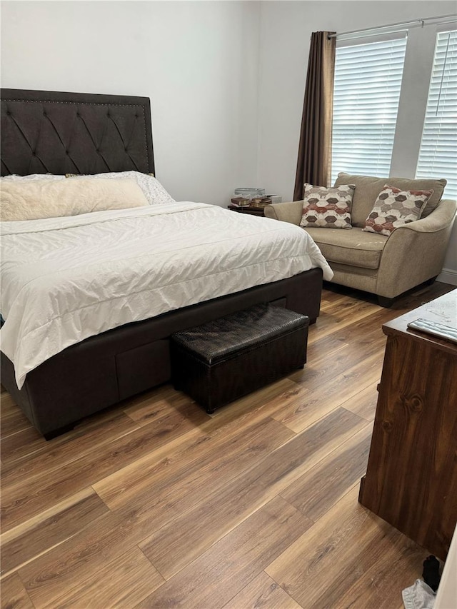 bedroom featuring wood-type flooring