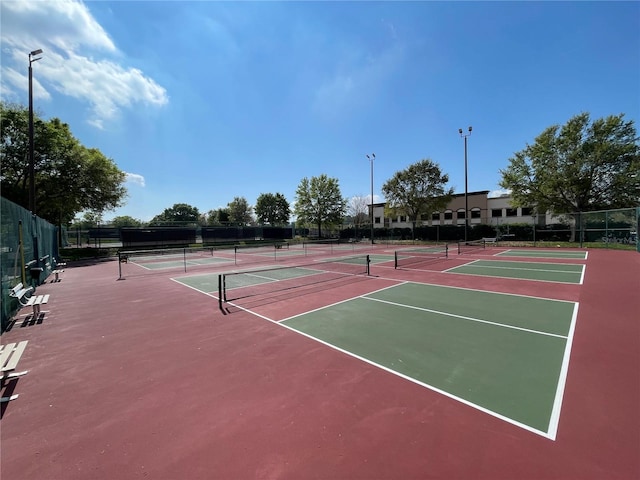 view of sport court with basketball hoop