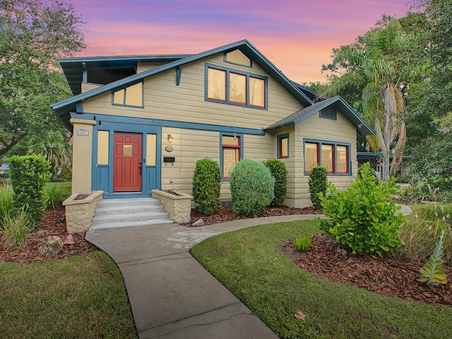 view of front of home featuring a yard