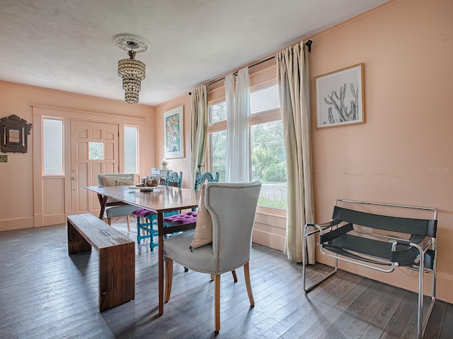 dining space with dark hardwood / wood-style floors