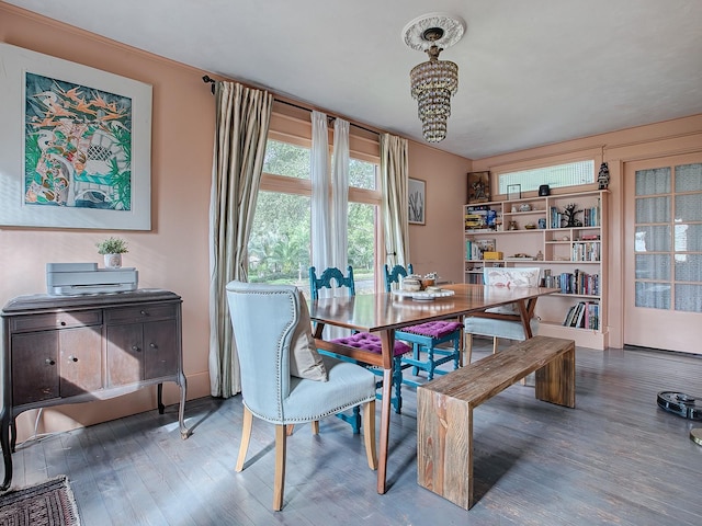 351 W 10th Ave, Mount Dora, FL 32757 - dining area with wood finished floors and a chandelier