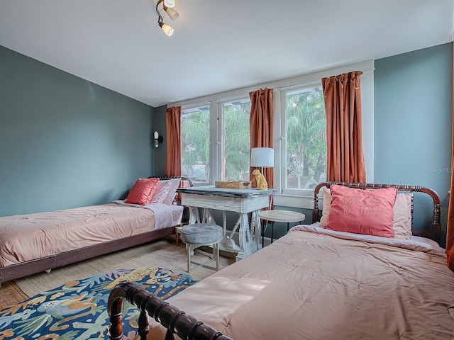 bedroom featuring hardwood / wood-style floors