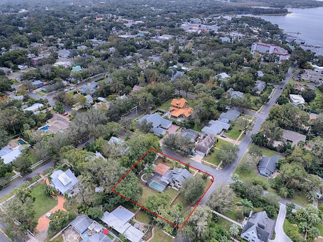 351 W 10th Ave, Mount Dora, FL 32757 - aerial perspective of suburban area featuring property parcel outlined and a nearby body of water