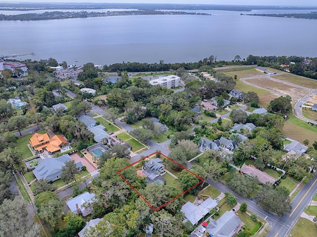 351 W 10th Ave, Mount Dora, FL 32757 - aerial overview of property's location with property boundaries highlighted and a nearby body of water