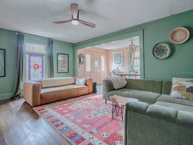 living room with hardwood / wood-style flooring and ceiling fan