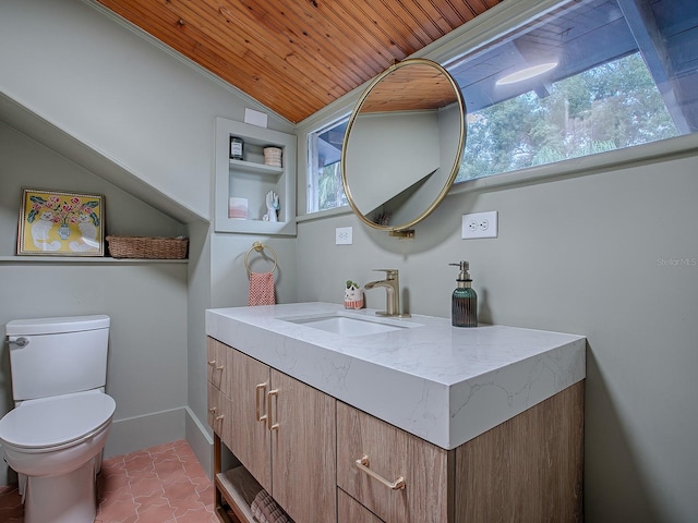 bathroom with toilet, vanity, wood ceiling, and vaulted ceiling