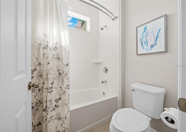 bathroom with tile patterned floors, toilet, and shower / bathtub combination with curtain