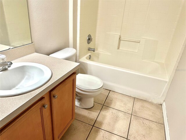 full bathroom with toilet, vanity, shower / bath combination, and tile patterned floors