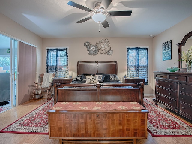 bedroom featuring ceiling fan and light hardwood / wood-style flooring