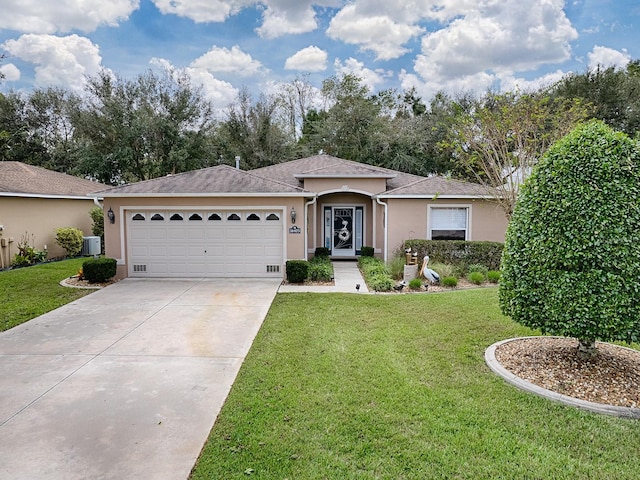 ranch-style home featuring central air condition unit, a garage, and a front lawn