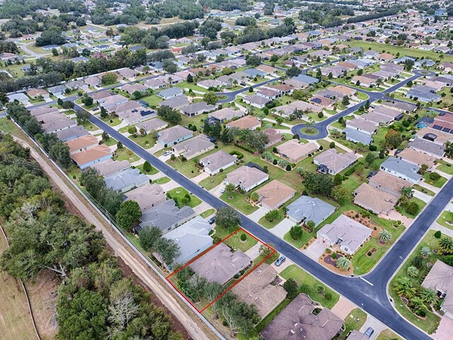 aerial view of residential area featuring property parcel outlined