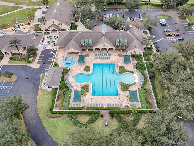 view of property location featuring a pool
