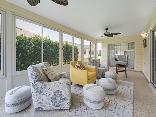 sunroom with ceiling fan