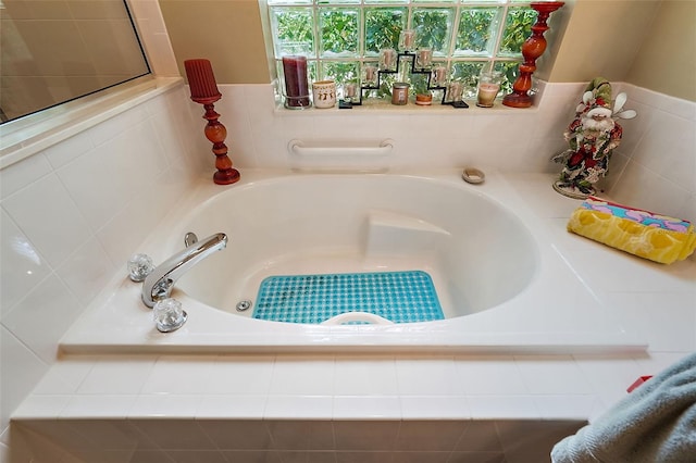 interior space with tiled tub