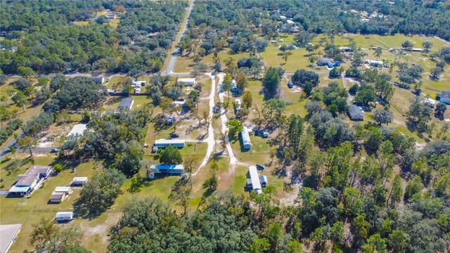 aerial view featuring a forest view