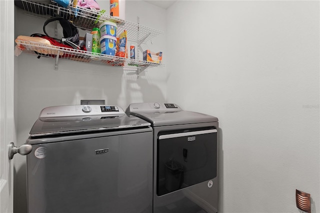 laundry area featuring washer and clothes dryer