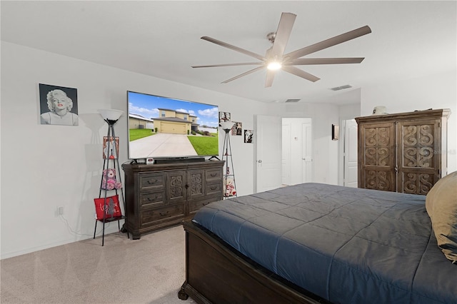 carpeted bedroom featuring ceiling fan