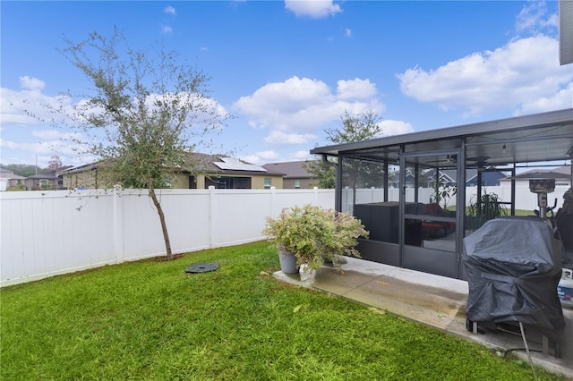 view of yard featuring a sunroom