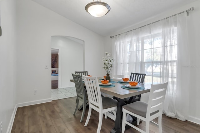 dining area featuring hardwood / wood-style floors