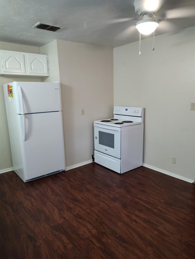 kitchen featuring dark hardwood / wood-style flooring, white cabinetry, white appliances, and ceiling fan