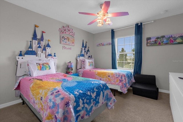 bedroom featuring ceiling fan, carpet flooring, and baseboards