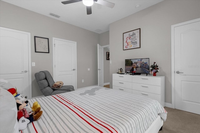 bedroom featuring carpet flooring, visible vents, and a ceiling fan