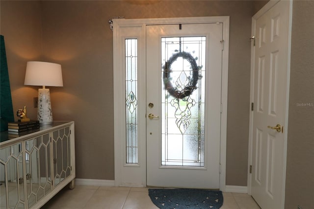 view of tiled foyer entrance