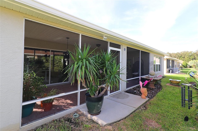 view of yard with a sunroom