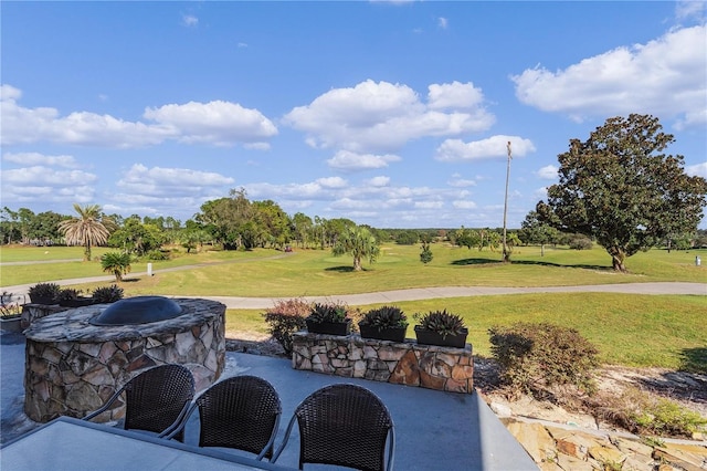 view of patio featuring a fire pit