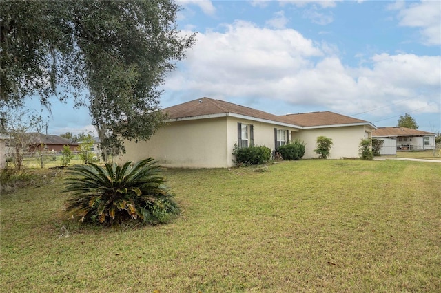 exterior space featuring a lawn