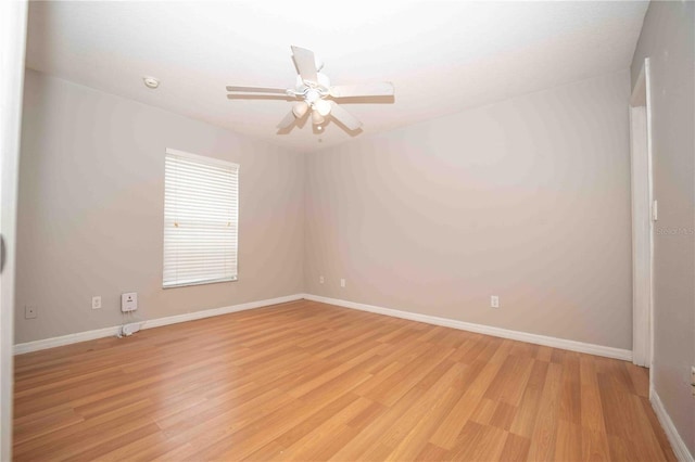 unfurnished room with ceiling fan and light hardwood / wood-style flooring