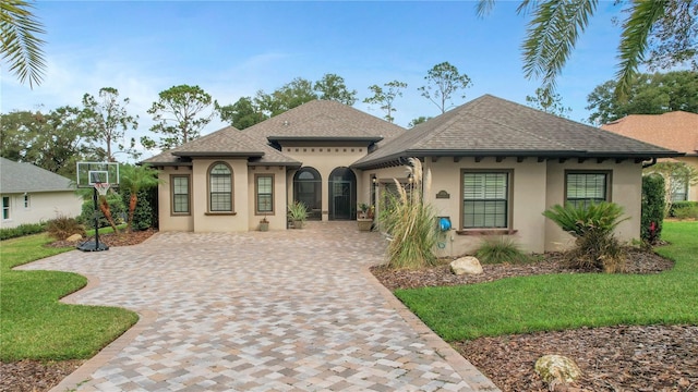 view of front of home with a front lawn