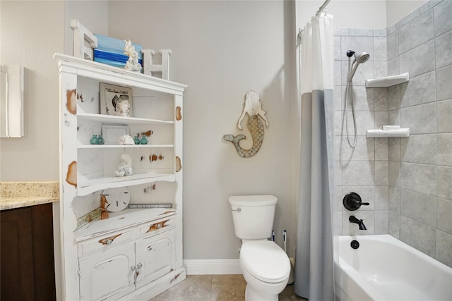 full bathroom featuring tile patterned flooring, shower / bath combination with curtain, vanity, and toilet