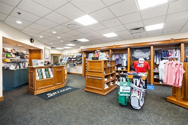 1720 Park Forest Blvd, Mount Dora, FL 32757 - miscellaneous room with dark colored carpet and a drop ceiling