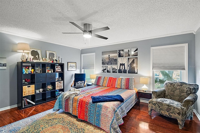 bedroom with dark wood-type flooring, ceiling fan, a textured ceiling, and crown molding