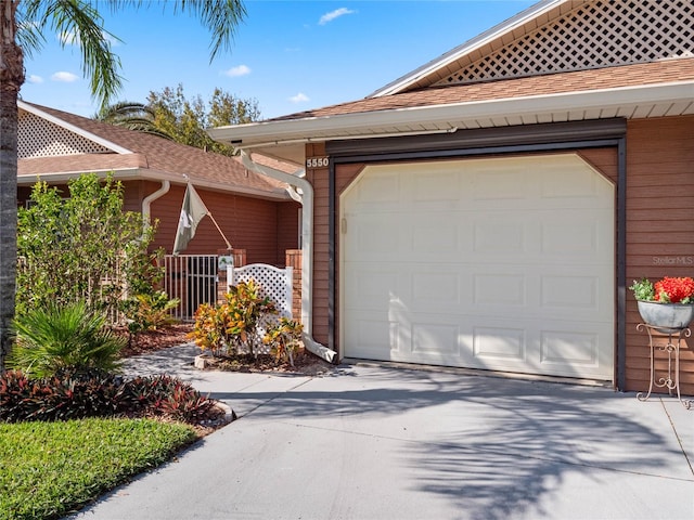 ranch-style home with a garage