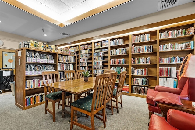 interior space featuring light colored carpet