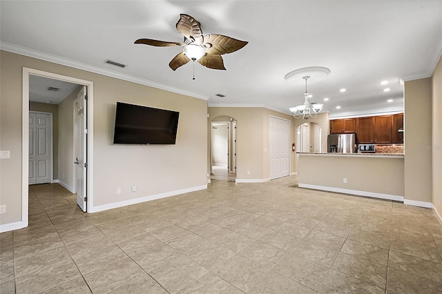 unfurnished living room featuring ceiling fan with notable chandelier and crown molding