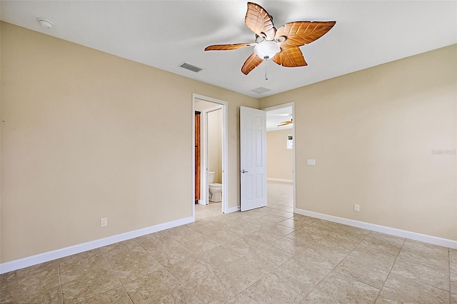 unfurnished room with ceiling fan